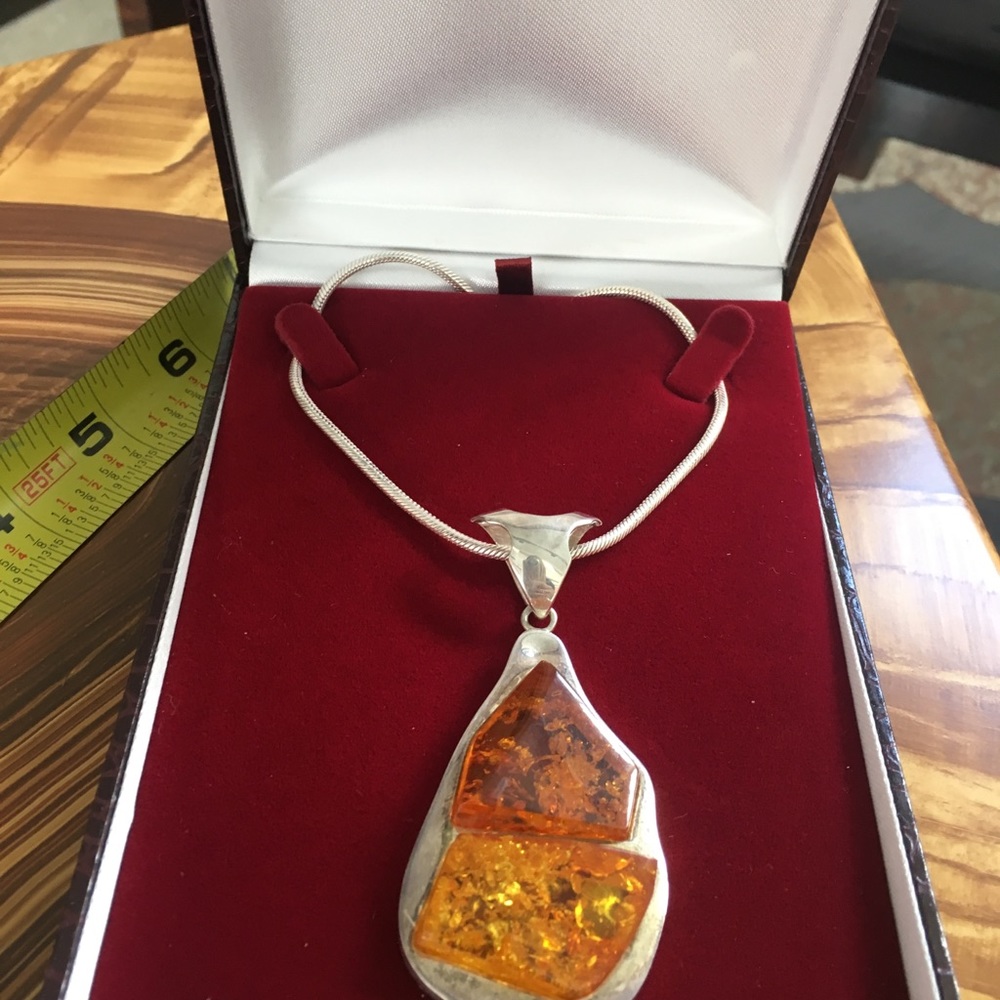 Silver necklace with amber drop